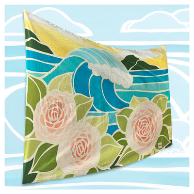 A sarong featuring beautiful roses and a dreamlike wave at sunset by Hawaii surf artist Heather Brown