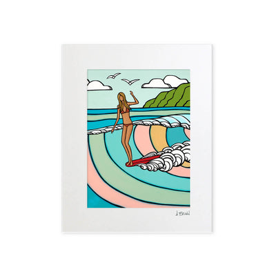 Matted art print by Hawaii artist Heather Brown featuring a surf girl on a red longboard riding a pastel colored wave.