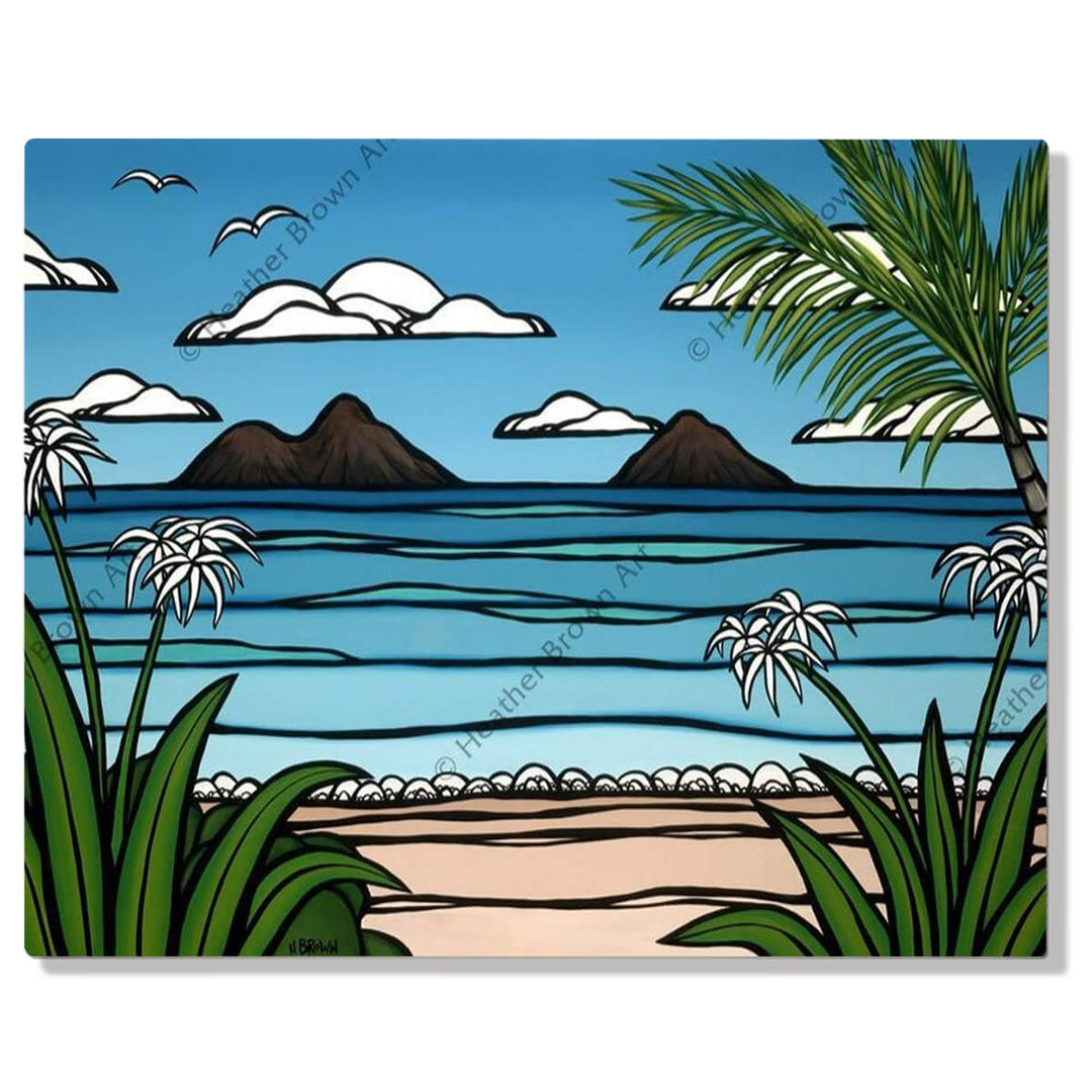 A metal art print featuring a swaying palm tree, tropical flowers, gorgeous blue waves, volcanos, and birds in flight by Hawaii surf artist Heather Brown