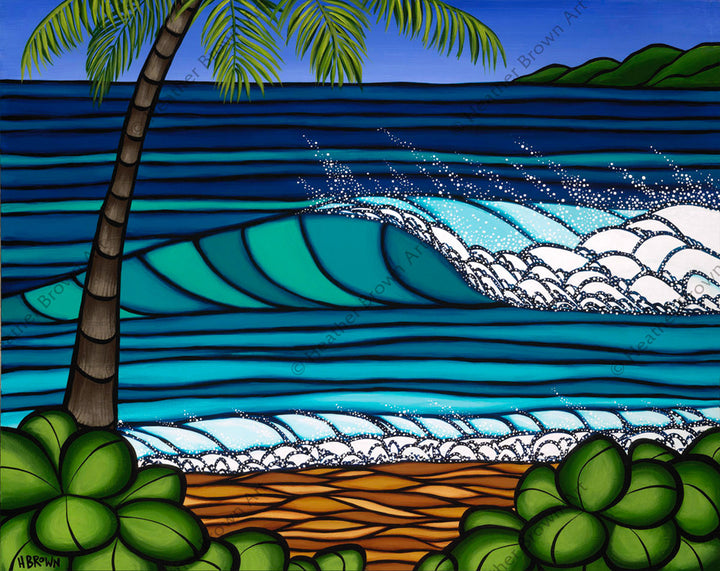 The rolling waves of Hawaii wash onto a peaceful beach