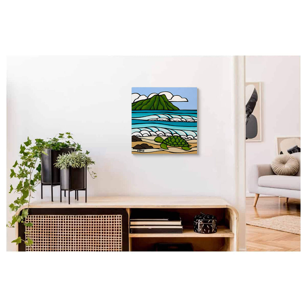 A metal art print featuring a smiling turtle with some rolling waves and the famous Diamond Head by Hawaii surf artist Heather brown