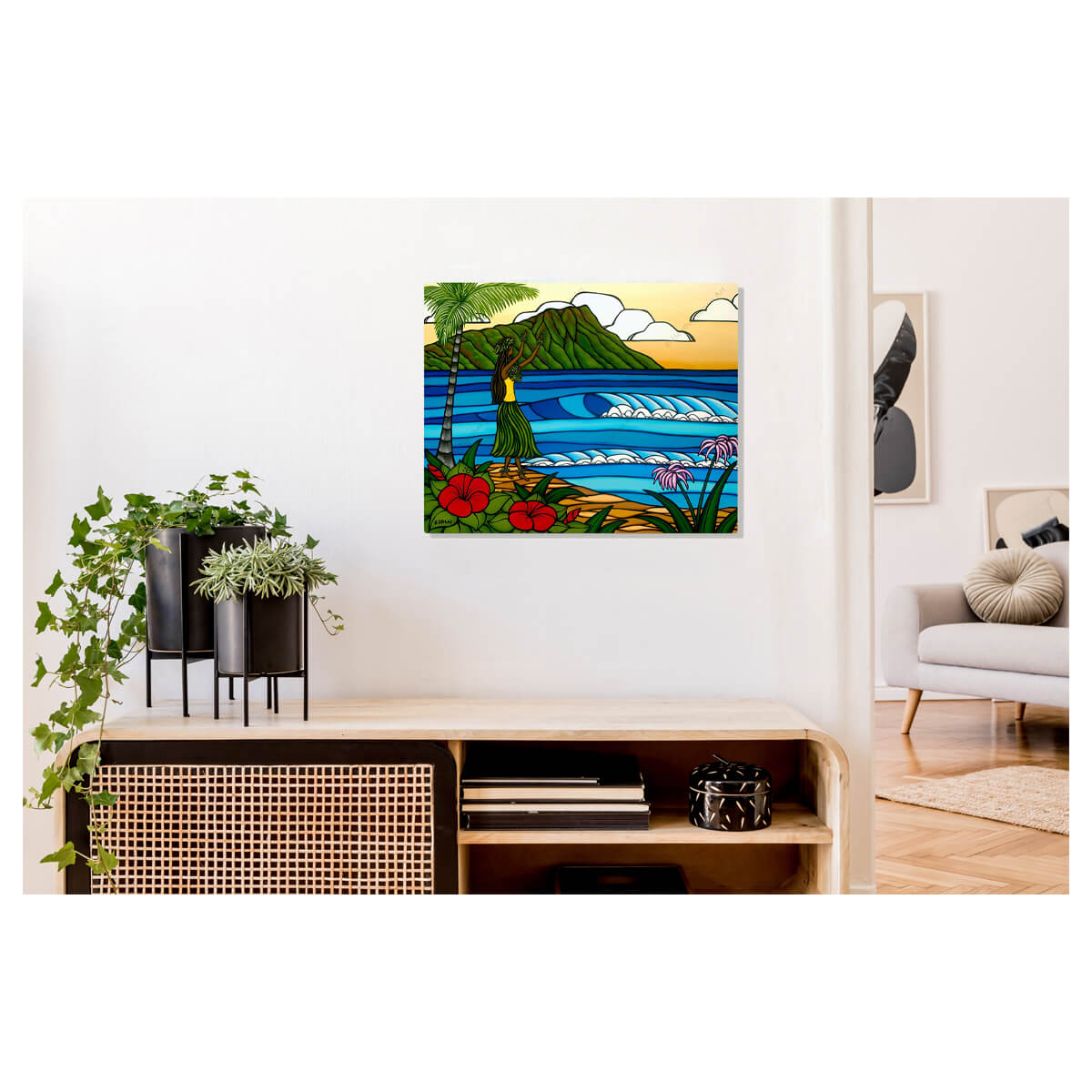 A metal art print featuring a Hawaiian hula girl dancing on the beach with a backdrop of Diamond Head Crater, crashing blue waves, palm trees, tropical red flowers, & a sunset yellow sky by Hawaii surf artist Heather Brown
