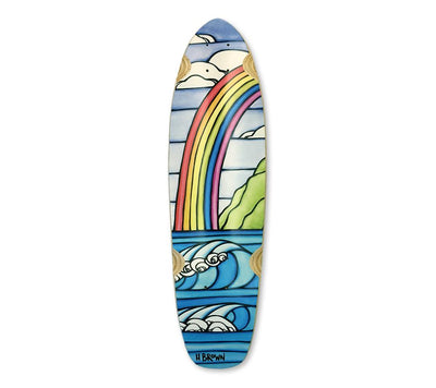 Skateboard with a classic Hawaiian rainbow arcing towards the ocean - Art by Heather Brown