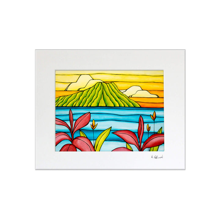 A matted art print featuring Diamond Head from a distance of calm waters framed by some beautiful tropical flowers by Hawaii surf artist Heather Brown