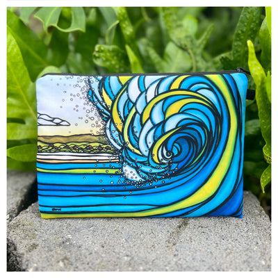 a beach clutch featuring a perfect barrel wave from a surfer's point of view by Hawaii surf artist Heather Brown