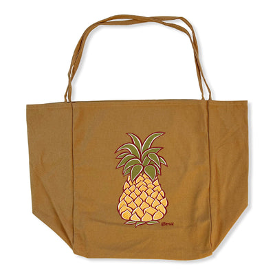 A brown thin handle tote bag featuring a stylized Hawaiian pineapple by Hawaii surf artist Heather Brown