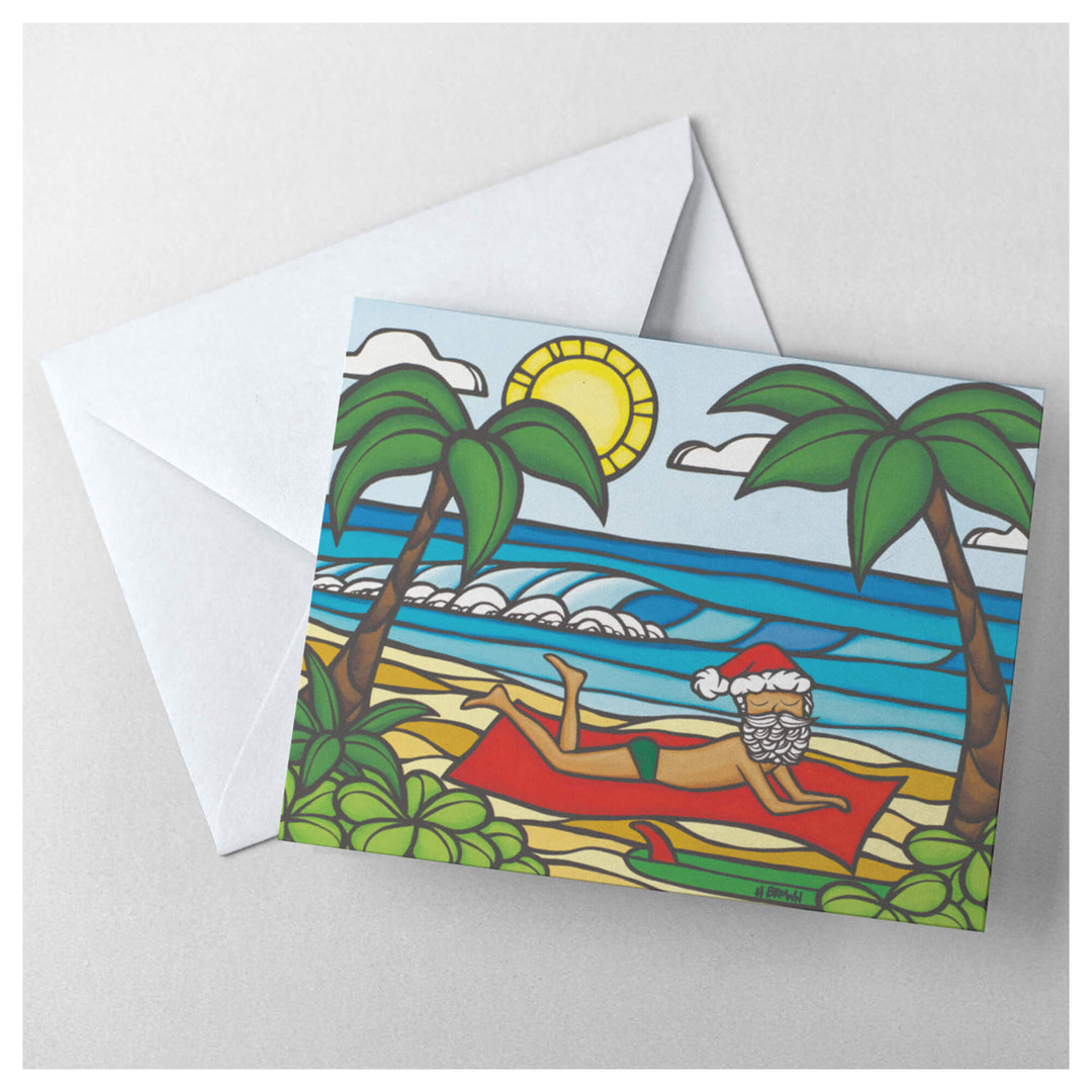 A greeting card featuring Santa Claus out for a day of sun and sea by Hawaii surf artist Heather Brown