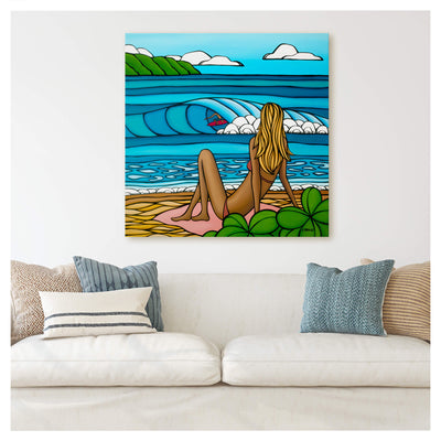 A woman watching a surfer riding the epic waves of Hawaii by Kauai surf artist Heather Brown