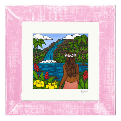 A framed matted art print of a local woman enjoying the waterfall view with colorful tropical flowers surrounding her by Hawaii surf artist Heather Brown
