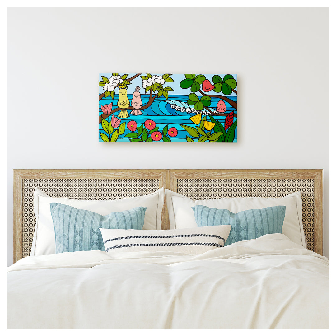 A canvas giclée print featuring some tropical flowers, and colorful birds sitting on tree branches framing rolling waves by Hawaii surf artist Heather Brown