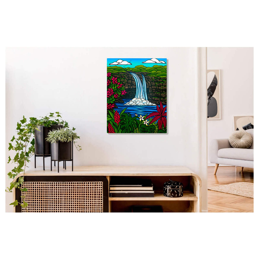 A metal art print featuring a tranquil pool, waterfall, tropical flowers, mountains, and a beautiful blue sky by Hawaii surf artist Heather Brown