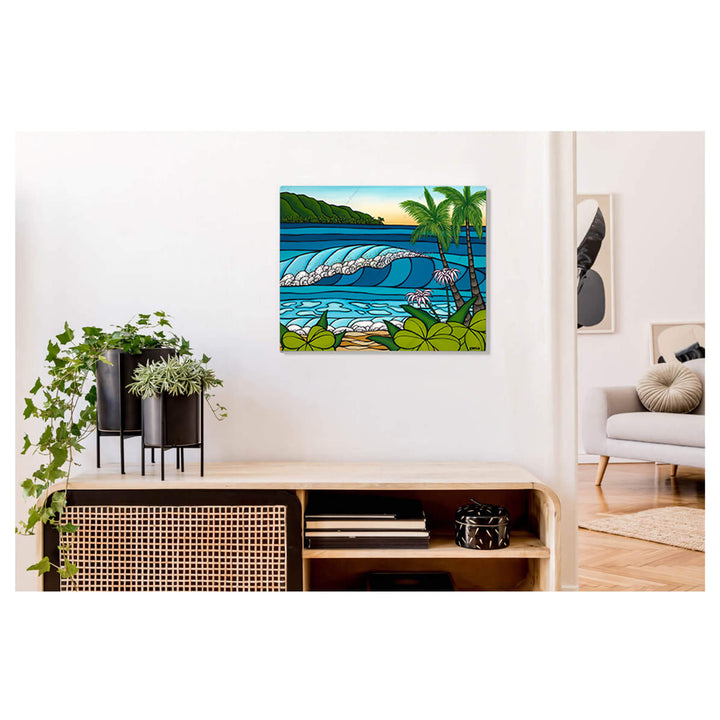 A metal art print featuring a wave-catching rainbows in its spray as it rolls towards the shore by Hawaii surf artist Heather Brown